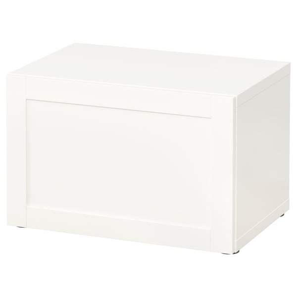The BESTÅ unit is a white, rectangular storage cabinet with clean, minimalist design, one visible door, and adjustable feet for stability.