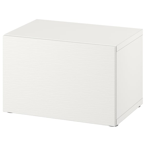 A white BESTÅ storage unit. Its square-shaped with clean lines and a minimalist design, perfect for organising.
