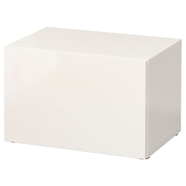 A white BESTÅ storage unit. Its a rectangular, modern design with a smooth finish. The unit is simple and sleek, designed for storage.
