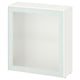 Depicts a white BESTÅ cabinet. Its rectangular, with a frosted glass door and a sleek, modern design.