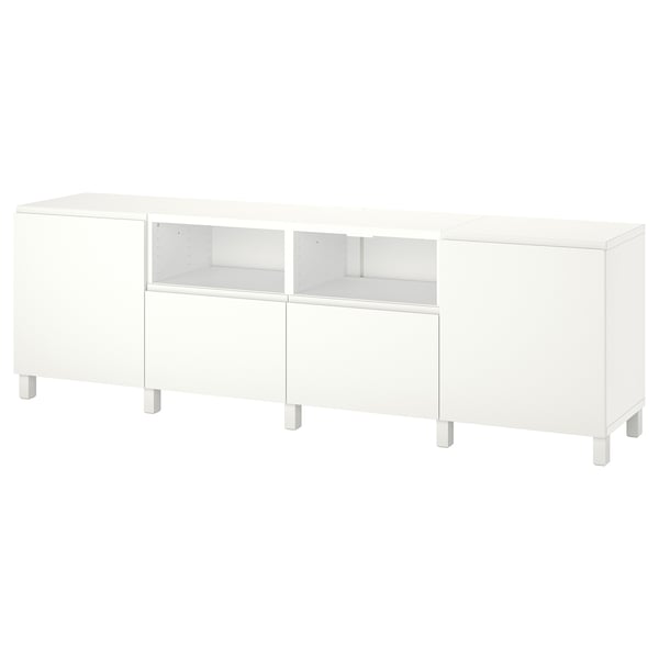 White BESTÅ tv unit with minimalist design, featuring storage shelves and drawers.