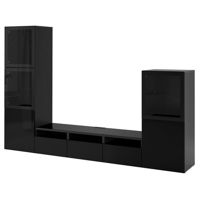 Black BESTÅ tv unit with glossy finish, featuring shelves and cabinets for storage and displaying items.