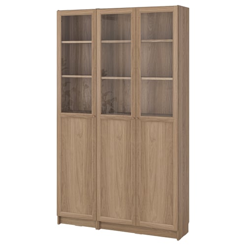 Tall BILLY bookcase, light brown wood, glass doors, rectangular.