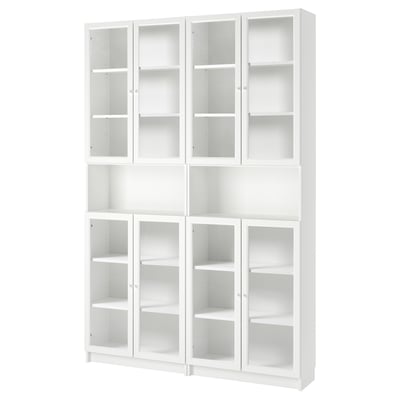 White BILLY bookcase with glass doors. Modern, minimalist storage.