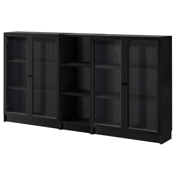 Black BILLY bookcase with glass doors and adjustable shelves.