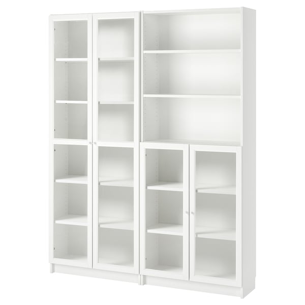 A white BILLY bookcase with multiple shelves and glass doors.