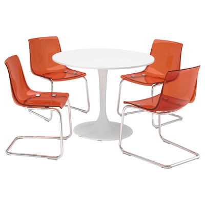 Four orange chairs with white round table. Modern, cantilever design.