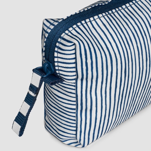 Blue and white striped bag with zip and handle, made from recycled polyester.
