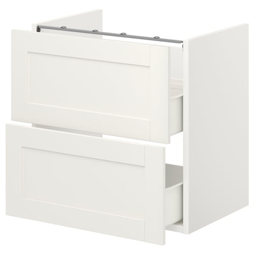 A white ENHET bathroom cabinet with two open drawers. It clean lines and a modern design.