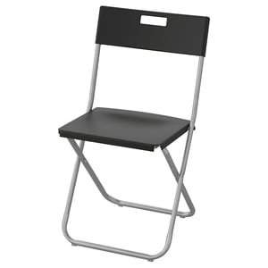 GUNDE: black folding chair with metallic frame, square seat, back handle, wall-hangable.