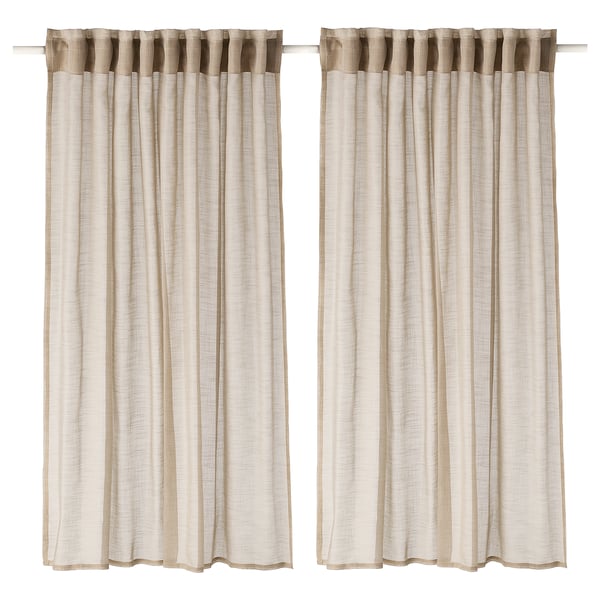 Two light beige sheer curtains hang side by side, featuring a simple, elegant design with heading tape for easy pleated display.
