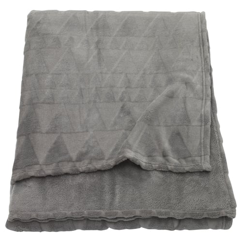 HARKÅL grey recycled fleece blanket, folded, soft with diamond pattern.