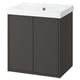 Black IKEA HAVBÄCK vanity with white sink, modern design.