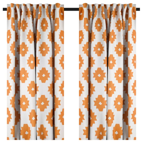Pair of boho-style orange and white curtains with geometric patterns, dense fabric for privacy and light blocking.