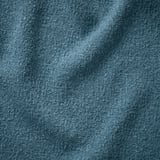 Soft, textured grey fabric close-up, likely JÄTTEBO sofa cover, showcasing its plush, inviting quality.