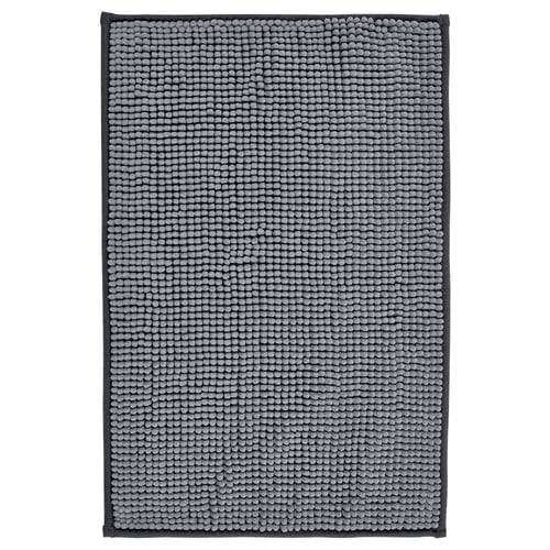 Grey textured fabric bath mat, rectangular, recycled polyester, textured surface, plain design, non-slip backing.