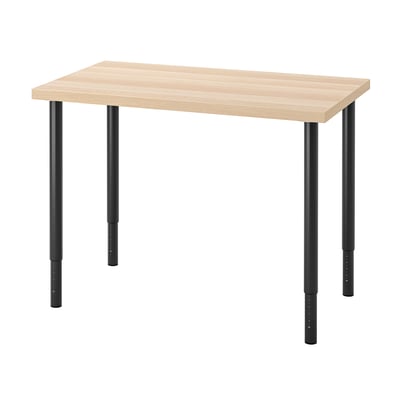 The LINNMON table a light oak top and black adjustable legs.