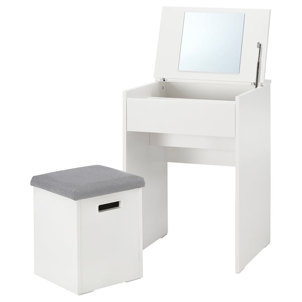A white MALMSLÄTT compact dressing table with a flip-up mirror and a padded chair with hidden storage, ideal for small spaces.