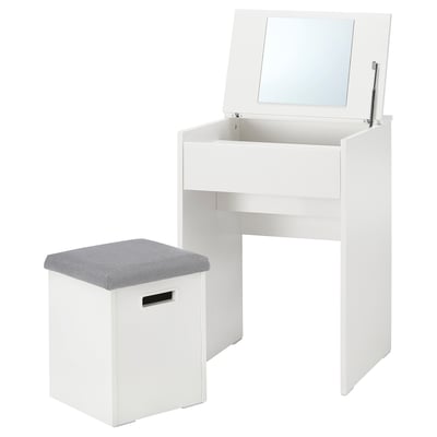 A white MALMSLÄTT compact dressing table with a flip-up mirror and a padded chair with hidden storage, ideal for small spaces.