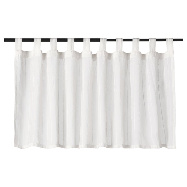 MATILDA curtains in white, made from recycled polyester, with a tab-top design for easy hanging.