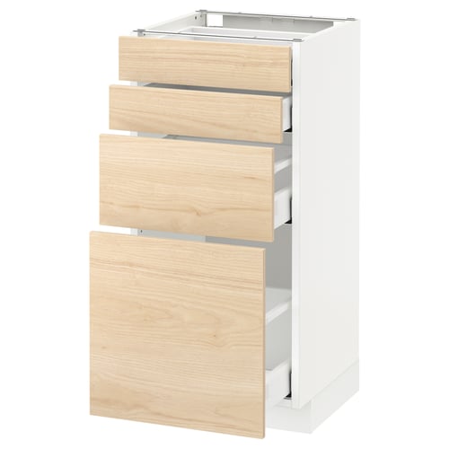 Modern white ikea METOD unit with three light ash wooden drawers, partially open, showcasing organized storage.