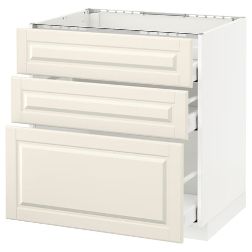 This image shows a white METOD kitchen cabinet with multiple drawers in a classic design, featuring off-white bevelled edges and sturdy construction.