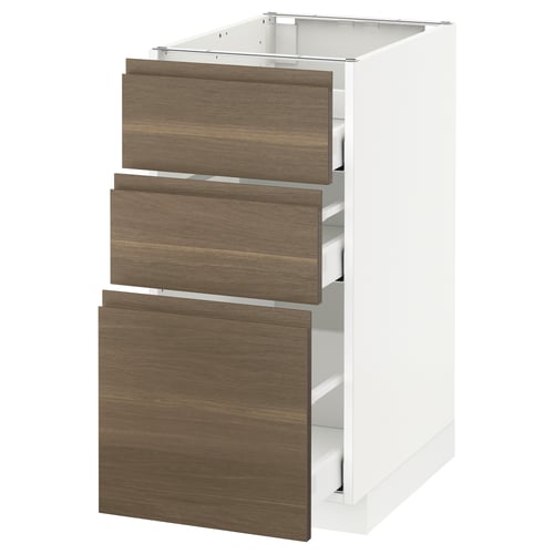 METOD white kitchen cabinet with 3 dark walnut drawers.