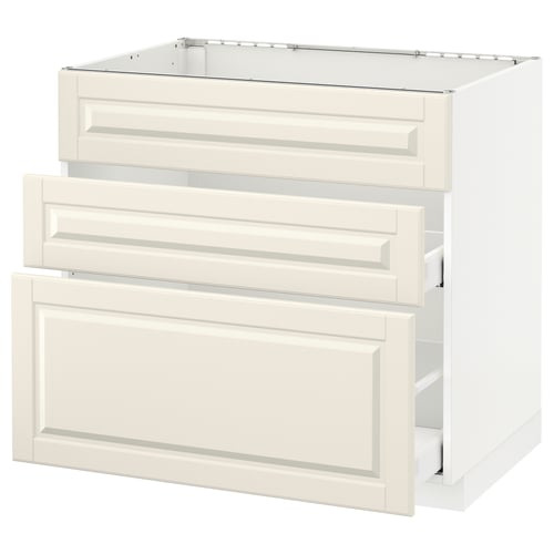 Off-white METOD kitchen cabinet with bevelled drawer fronts, including two open drawers.