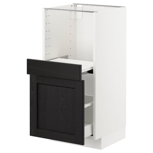 A white METOD kitchen cabinet with a dark wood-stained drawer front and bevelled edges.
