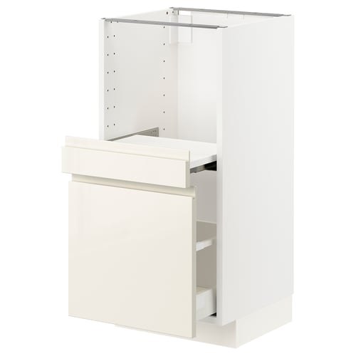 White ikea METOD kitchen cabinet with high gloss drawer and pull-out shelf, modern design.