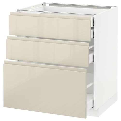A white and beige METOD kitchen cabinet with three drawers. The cabinet modern, smooth-running drawers in a high-gloss beige finish.