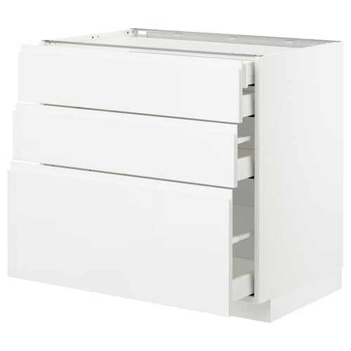 White METOD kitchen cabinet with three drawers and glossy finish.