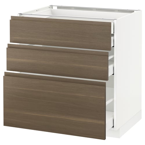 A white ikea METOD kitchen cabinet with three dark walnut-effect drawers. The drawers have a sleek, minimalist design with integrated handles.