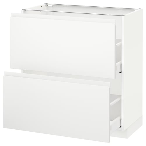 White modern kitchen cabinet with smooth drawers, minimalist design.