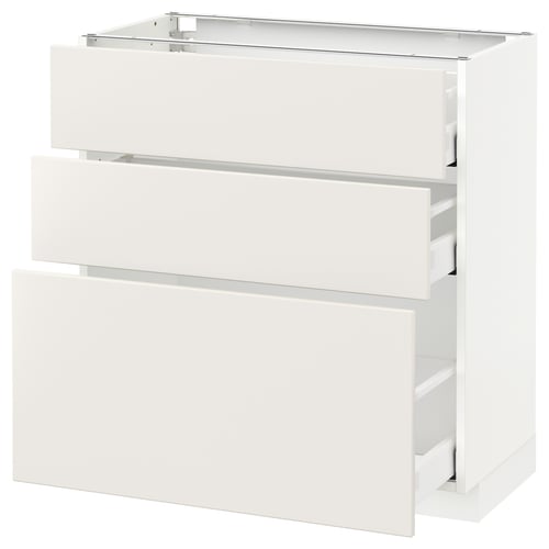 A white METOD kitchen cabinet with three drawers, part of the veddinge series.