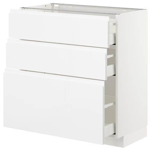 A white METOD kitchen storage unit with smooth, glossy fronts and integrated handles. It three drawers with a sleek, modern design.
