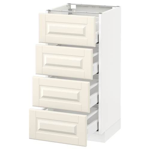 A white METOD kitchen cabinet with off-white drawers featuring bevelled edges.