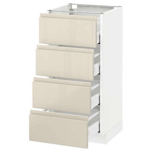 White METOD unit with 4 glossy beige drawers.