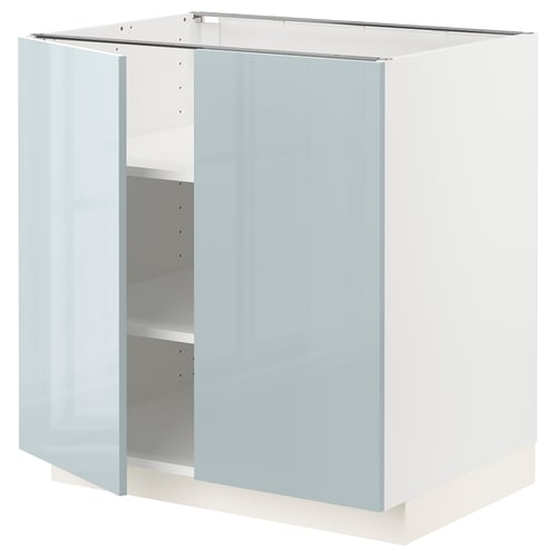 Light blue high-gloss METOD cabinet, modern kitchen unit with clean lines, open door showing shelves.