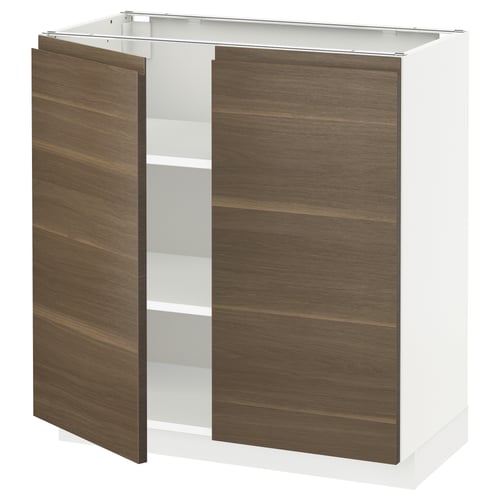 Modern white METOD kitchen cabinet with walnut doors.