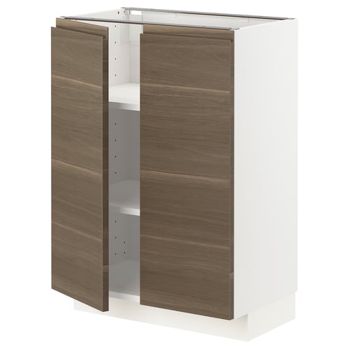 An ikea METOD kitchen cabinet in white with dark walnut effect doors. It has two doors with integrated handles and one adjustable shelf inside.
