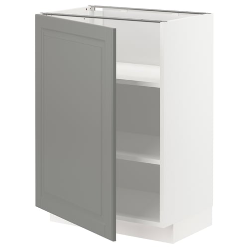 Open grey cabinet door on white METOD unit. Modern minimal design with adjustable shelves.