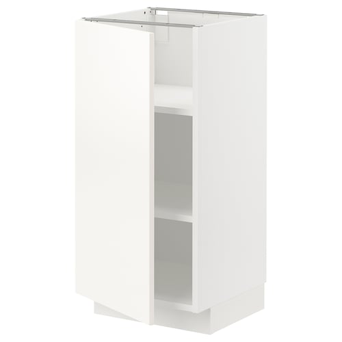 A white METOD kitchen cabinet, sleek and modern, with adjustable shelves and a clean, minimalist design.
