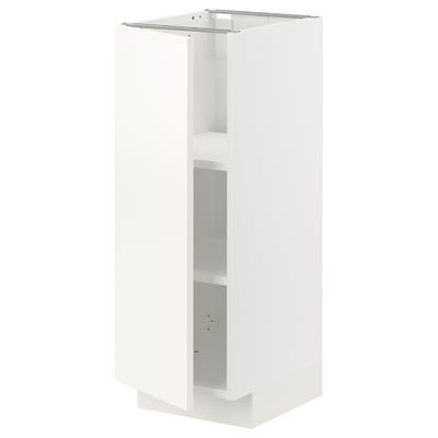 A tall white METOD kitchen cabinet with adjustable shelves.