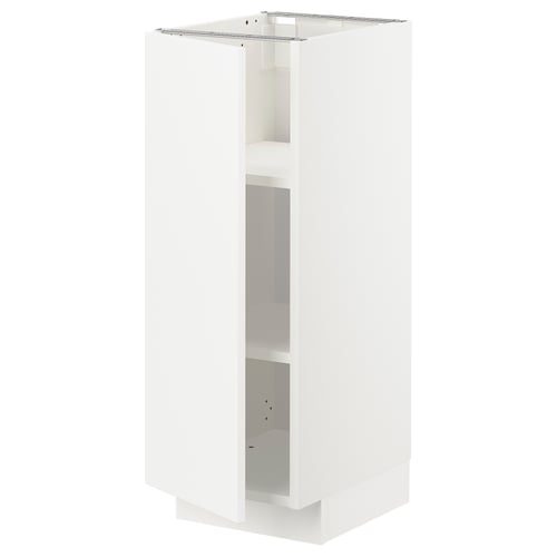White METOD kitchen cabinet with shelves, modern design, clean lines.