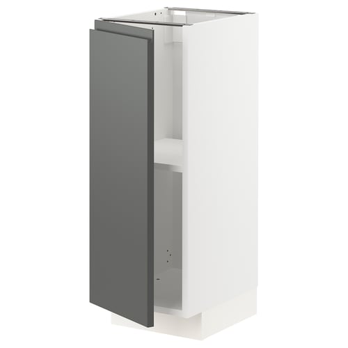 A white METOD kitchen cabinet with a grey door and integrated handles. It has a modern, sleek design.