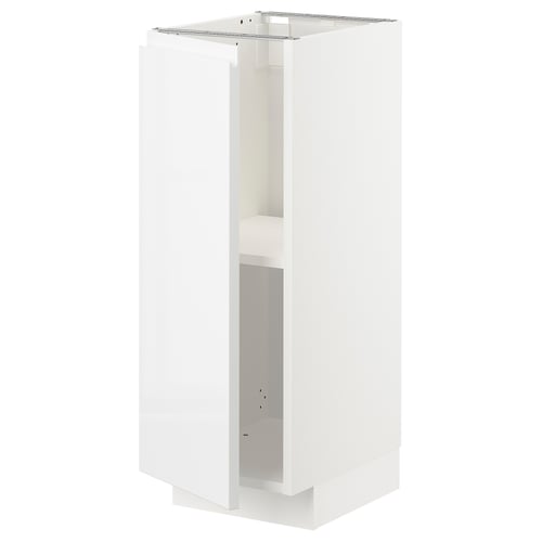 A white, tall, rectangular METOD kitchen cabinet with an open front, displaying shelves inside.