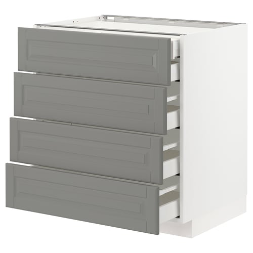 A white kitchen cabinet named METOD with four grey drawers. It has a modern design and uses wood materials.