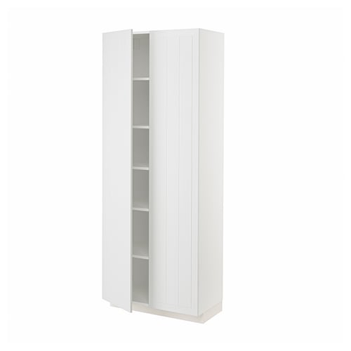White METOD kitchen cabinet with stensund fronts, tall and rectangular, two doors hiding shelves.