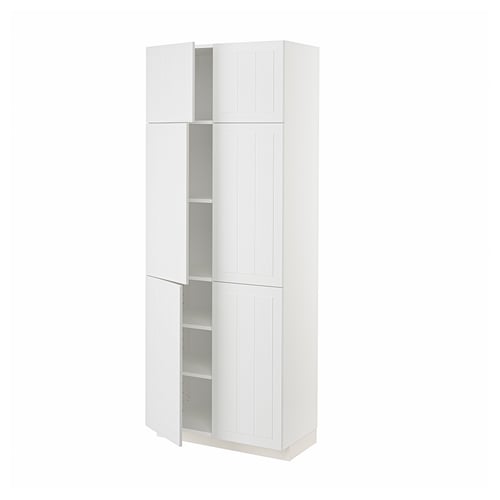 White METOD kitchen cabinet with four doors, adjustable shelves.